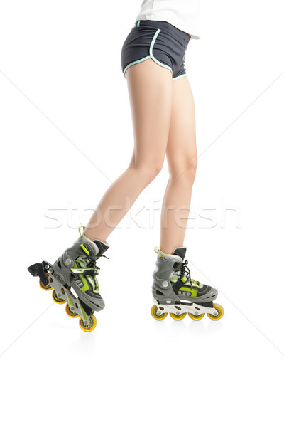 Close up  picture of woman's legs with rollerskates  Stock photo © julenochek