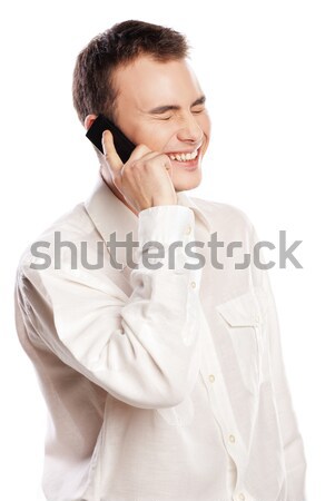Homem sorridente falante telefone isolado jovem Foto stock © julenochek