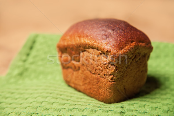 Bochenek brązowy chleba zielone serwetka żywności Zdjęcia stock © julenochek