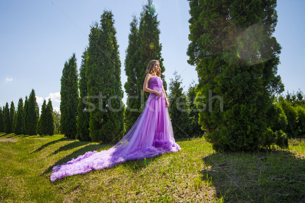 Young woman in beautiful dress amongst trees Stock photo © julenochek