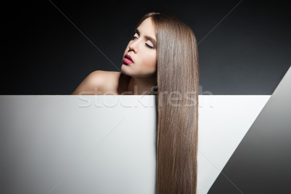 Close-up of young brunette with beautiful long hair Stock photo © julenochek