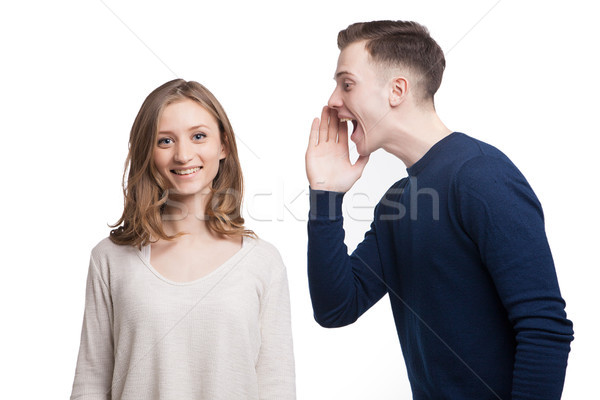 Copain hurlant quelque chose petite amie portrait femme souriante [[stock_photo]] © julenochek