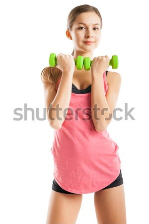 спортивный женщину вверх мышцы гантели улыбаясь Сток-фото © julenochek