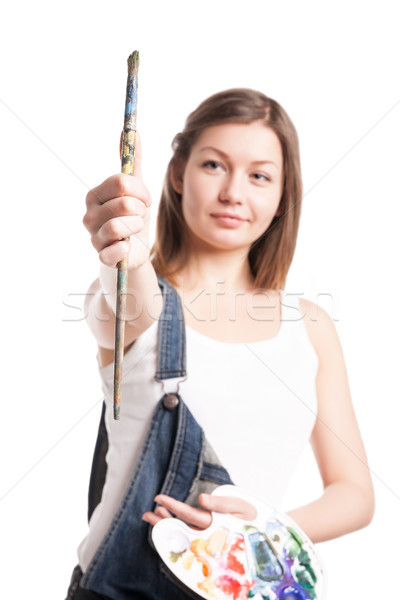 Artist woman with paint palette keeping brush  Stock photo © julenochek