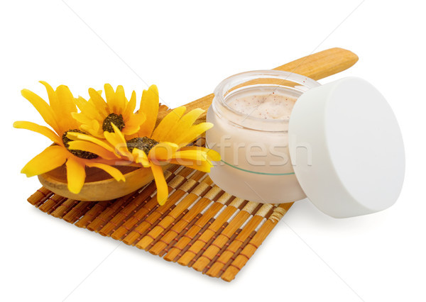 Spa cosmetic cream and flowers isolated on white Stock photo © julenochek