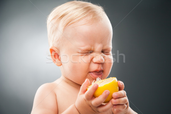 ребенка глазах лимона портрет смешные кислый Сток-фото © julenochek