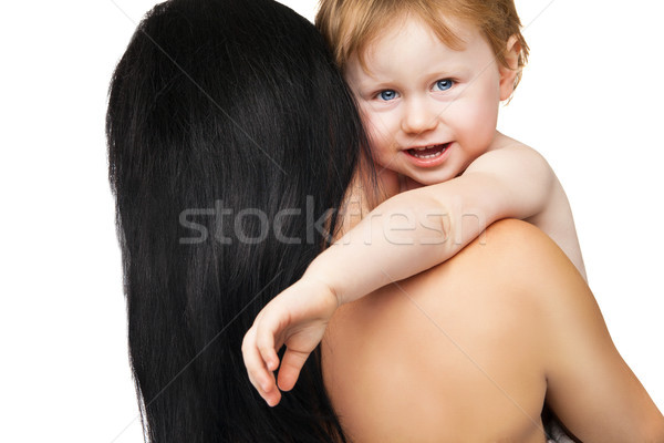 Mother with her baby after bathing in white towel Stock photo © julenochek