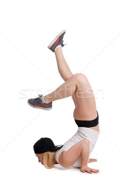 Woman standing on hands with feet lifted up isolated Stock photo © julenochek