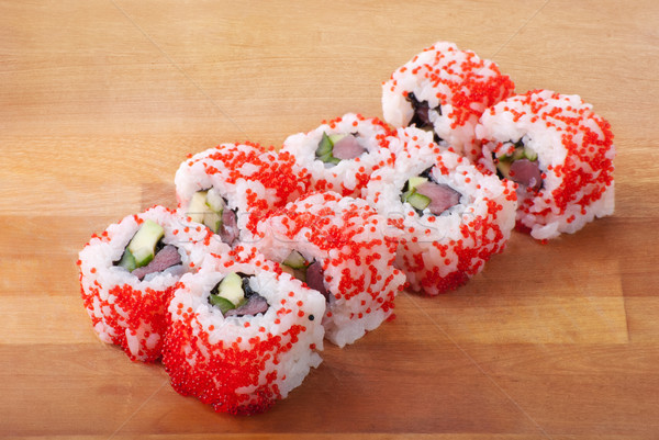 california sushi rolls on wooden plate Stock photo © julenochek