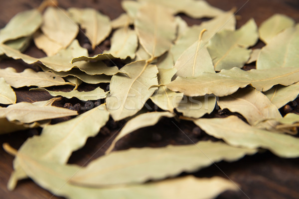 Bay laurel leaves on a wooden board Stock photo © julenochek