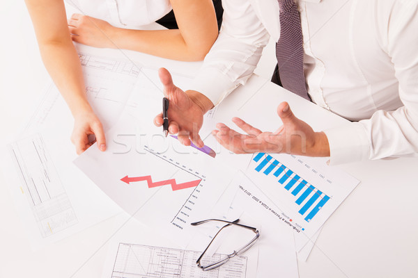 Businessman and businesswoman discussing in office isolated Stock photo © julenochek