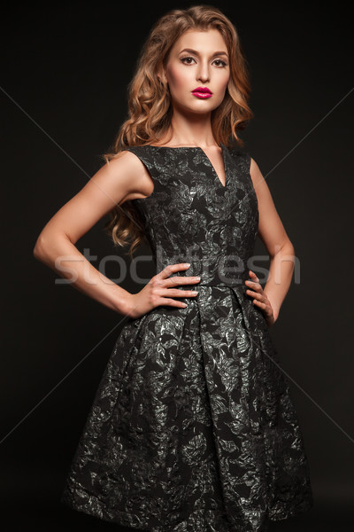 Atrakcyjny młoda kobieta sukienka stwarzające studio portret Zdjęcia stock © julenochek