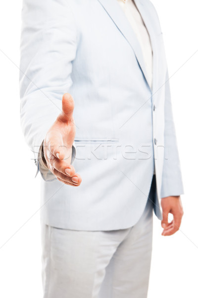Close up of businessman hand extended to handshake isolated on white  Stock photo © julenochek