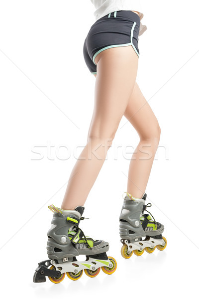Close up  picture of woman's legs with rollerskates  Stock photo © julenochek