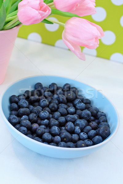 Lovely pink tulips and blueberries Stock photo © Julietphotography