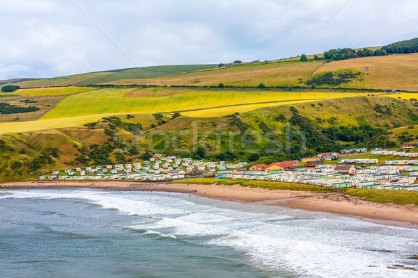 Beautiful Scottish landscape with cliffs and rocks and camping site Stock photo © Julietphotography