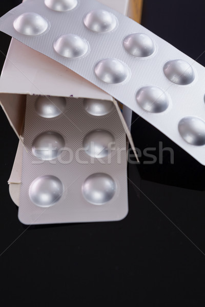 Silver blister pack of small pills Stock photo © juniart