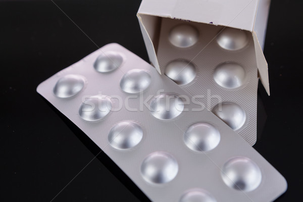 Silver blister pack of small pills Stock photo © juniart