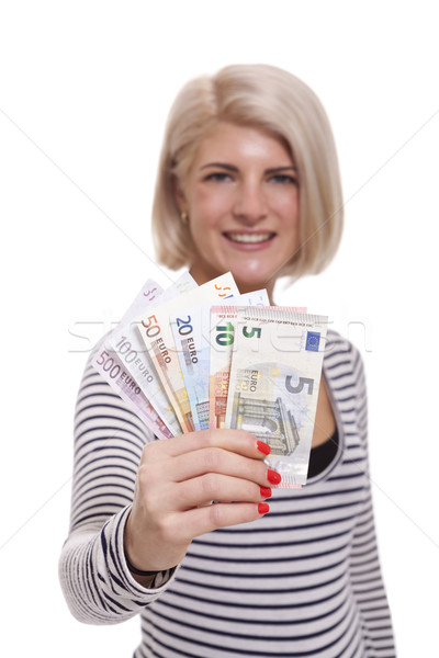 Stock foto: Lächelnde · Frau · halten · Euro · stellt · fest · anziehend · lächelnd