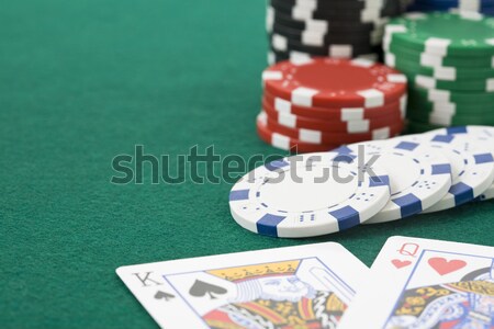 Stock photo: King and queen cards and poker chips