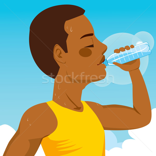 Esportes homem água potável africano americano jovem corredor Foto stock © Kakigori
