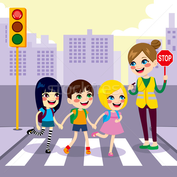 vector illustration of a schoolchildren crossing the road with the