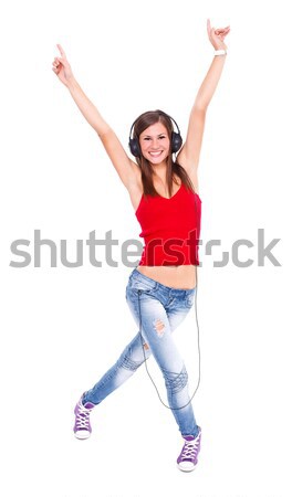 Niña feliz auriculares feliz mujer escuchar música Foto stock © kalozzolak
