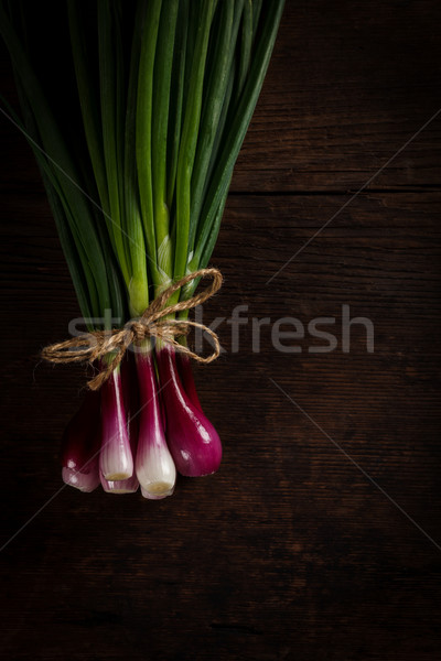 Oignons table en bois rustique fond vert [[stock_photo]] © kalozzolak