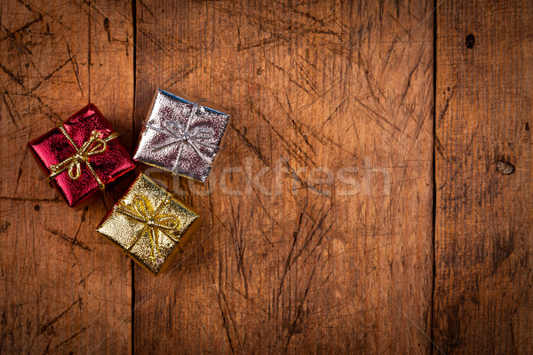 Tres pequeño caja de regalo vintage mesa de madera Navidad Foto stock © kalozzolak