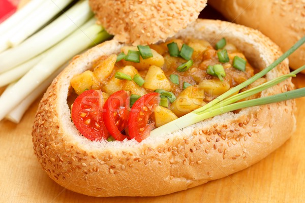 Goulash in bread bowl Stock photo © kalozzolak
