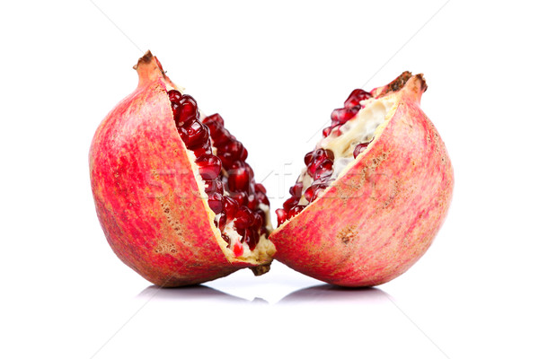 Grenadine cut in halves Stock photo © kalozzolak