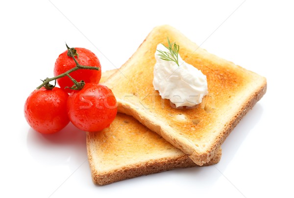 Stok fotoğraf: Tost · süzme · peynir · iki · parçalar · ekmek · domates
