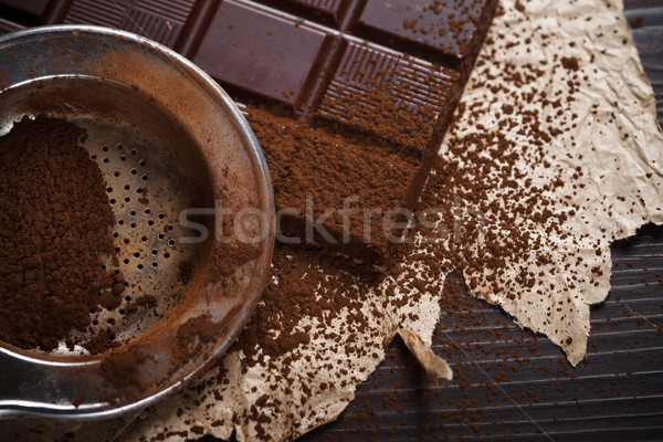 Cocoa dust on silver sieve Stock photo © kalozzolak