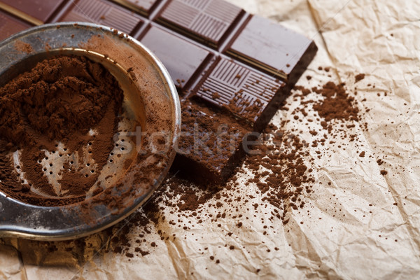 Cacao powder and chocolate bar Stock photo © kalozzolak