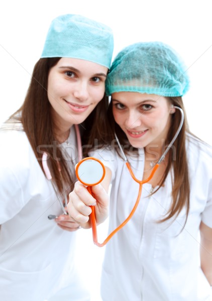 Médecins stéthoscope deux jeunes médicaux souriant [[stock_photo]] © kalozzolak