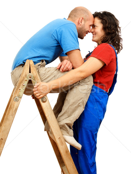 Happy couple on the ladder Stock photo © kalozzolak