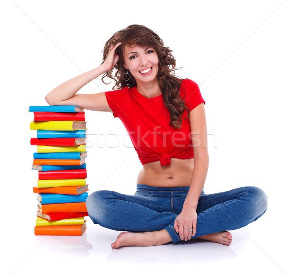 Fille beaucoup livres séance coloré blanche [[stock_photo]] © kalozzolak