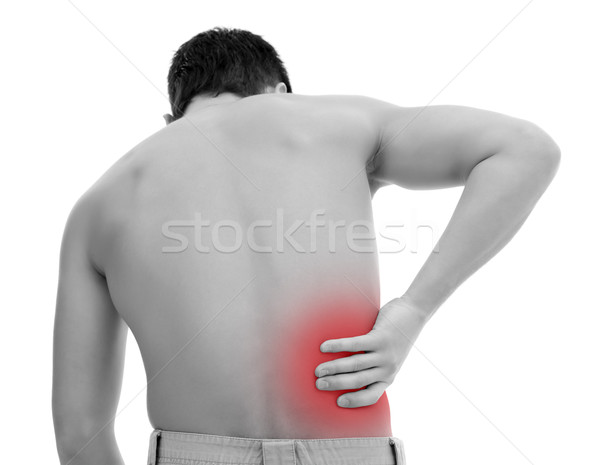Hátfájás fiatalember fájdalom hát kéz orvosi Stock fotó © kalozzolak