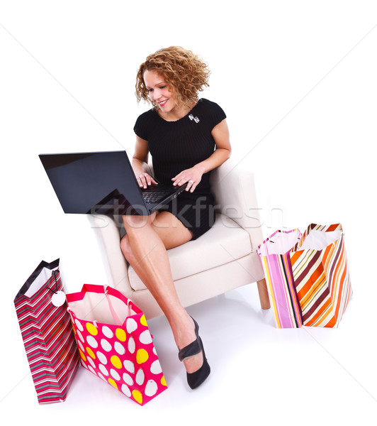 Young woman shopping online Stock photo © kalozzolak