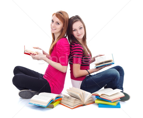 Placer lectura dos adolescente ninas libros Foto stock © kalozzolak