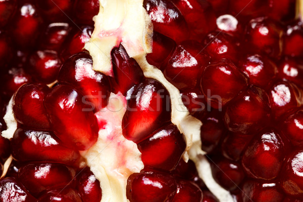 Macro shot of grenadine seeds Stock photo © kalozzolak