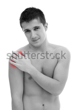 Férfi vállfájás fiatalember tart váll kéz Stock fotó © kalozzolak