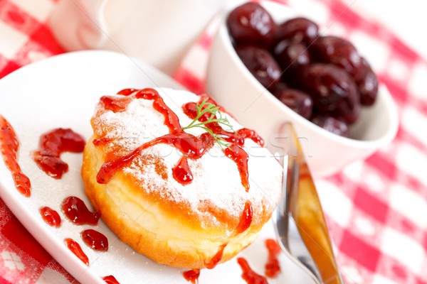 Sweet donut with jam Stock photo © kalozzolak