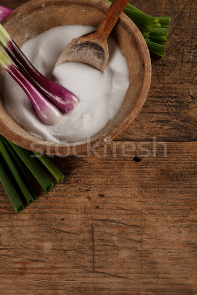 Old salt box and spoon with onions Stock photo © kalozzolak