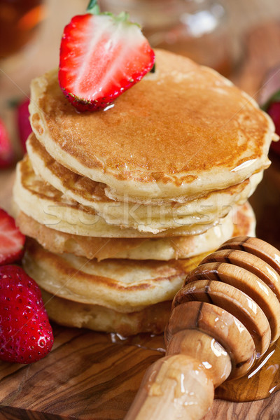 Stock photo: Pancakes with strawberry and honey