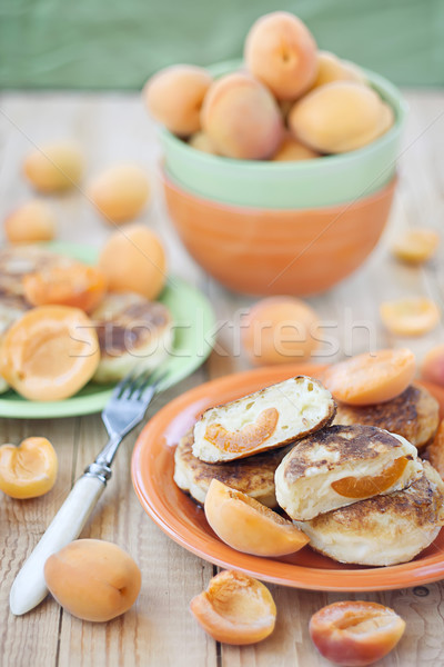 Quark pancakes with apricots Stock photo © Karaidel