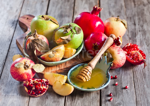 Pomegranate, apples and honey Stock photo © Karaidel