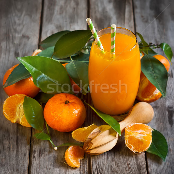 Mandarino succo vetro fresche maturo foglie Foto d'archivio © Karaidel
