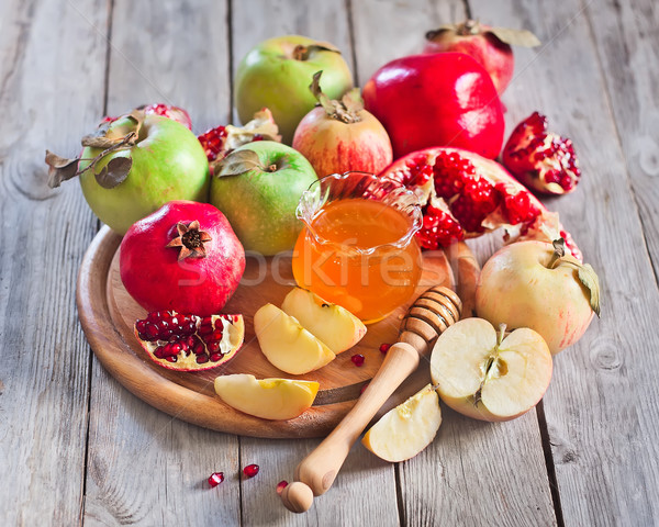 Pomegranate, apples and honey Stock photo © Karaidel