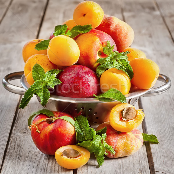 Apricots, nectarines and saturn peaches Stock photo © Karaidel
